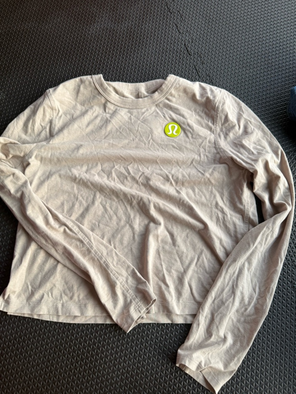 lululemon athletica long sleeve top in light beige with neon yellow logo
